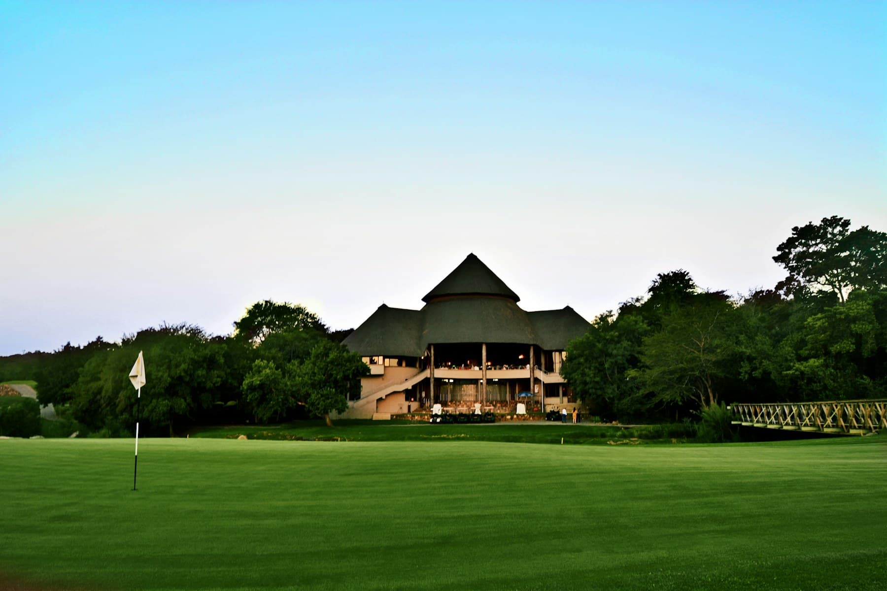 Golf course and clubhouse beyond the green